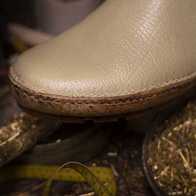 Close-up of a handcrafted leather shoe with stitched sole made in Montegranaro, Italy